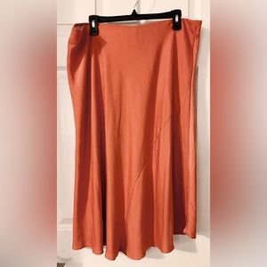 NWOT pumpkin colored silk-like slip skirt size XXL